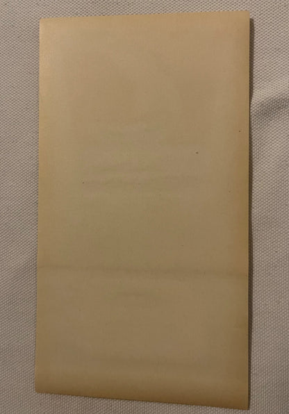 Back of the Viking broom label: blank tan paper