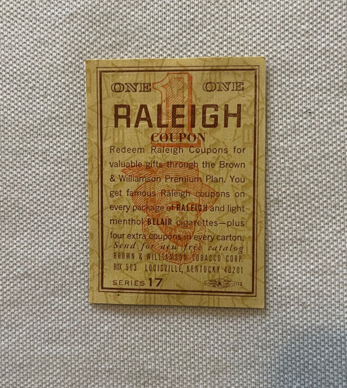 Vintage Raleigh cigarette coupon on tan cardstock with brown text, Series 17, from Brown & Williamson Tobacco Corp Louisville