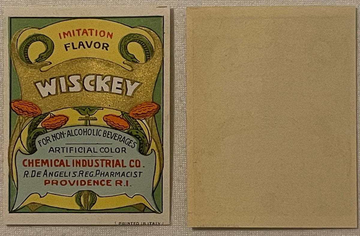 Vintage "Wisckey" whiskey flavor label with Art Nouveau design, ornamental handles, red flowers, and text for Chemical