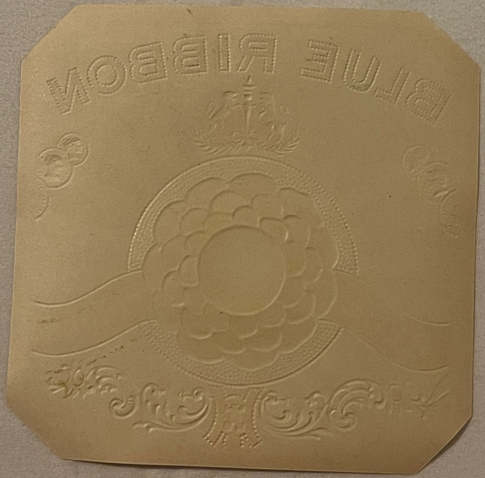 Gold embossed cigar box label with ornate decorative border and central portrait medallion, text reading "M.H. Sevis & Son Sp