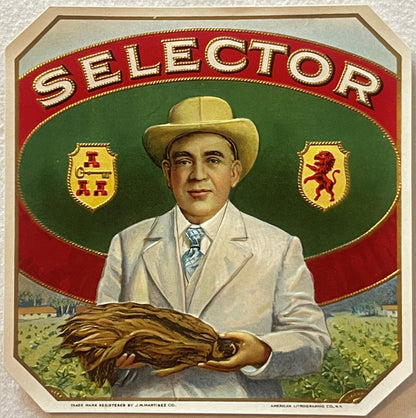 Vintage cigar box label featuring man in cowboy hat and light suit holding tobacco leaf, with "Selector" text and heraldic sh
