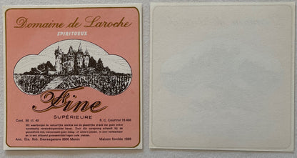 Front and back of a vintage pink liqueur label featuring a castle illustration, French text, and publisher details from Menin