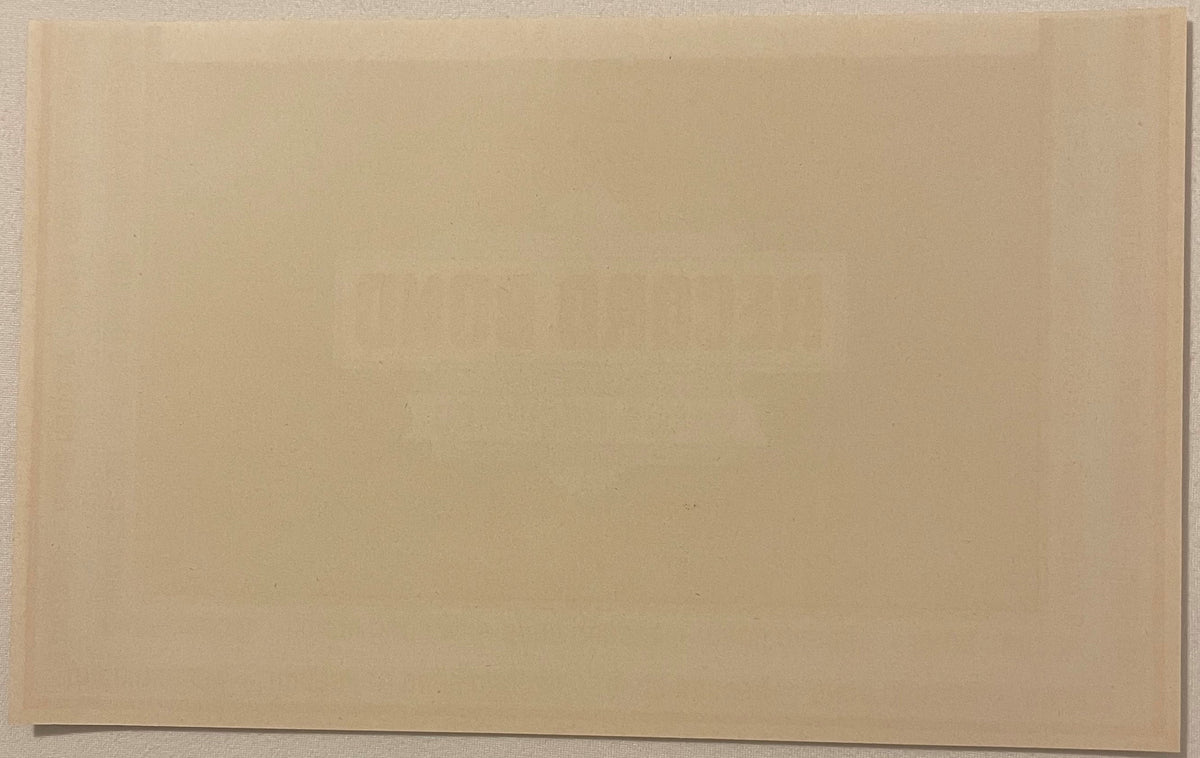 Reverse of the Record Bond label: blank cream paper with only a faint show-through ghost of the printing on the front - no printing of any kind on the back