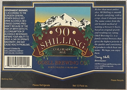 The whole 90 Shilling wraparound label laid flat: the government warning and bar code, the mountain design, and the brewery's story signed by Doug Odell
