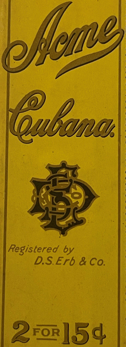 Yellow embossed cigar bag label reading "Acme Cubana" with ornate monogram, registered by D.S. Erb & Co, priced 2 for 15¢