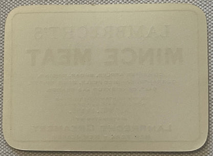 Lambrecht's Mince Meat label, reverse: blank cream paper, clean and unmarked, with the printing on the other side showing faintly through as mirror-image relief