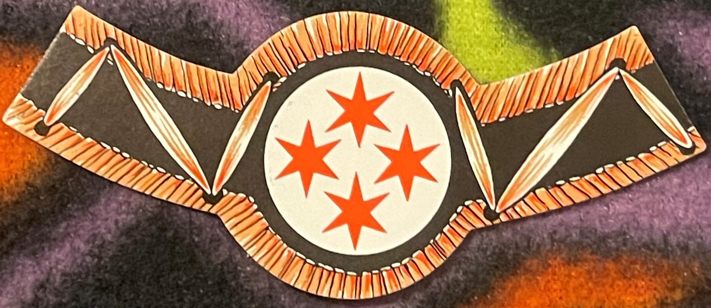 Antique wine neck label with orange wings flanking a cream circle containing four red stars, on dark textured background
