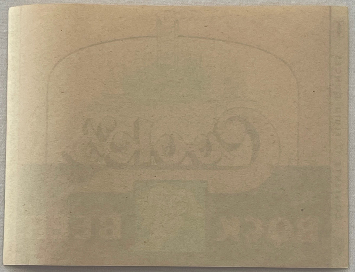 Cook's Bock Beer Label Steamboat & Goat Design, reverse: the blank back of the label in tan stock, with the printing from the front showing through the paper in mirror image