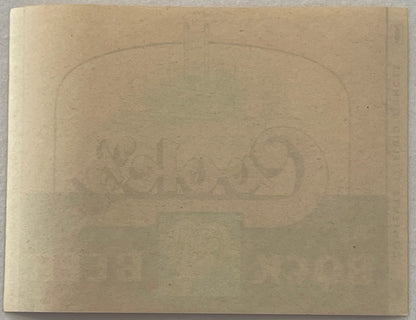 Cook's Bock Beer Label Steamboat & Goat Design, reverse: the blank back of the label in tan stock, with the printing from the front showing through the paper in mirror image