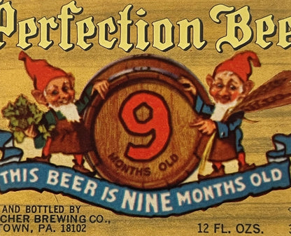 Vintage beer label with "Perfection Beer" text, red gnomes holding a barrel marked "9", blue banner