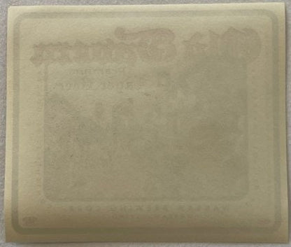 Cream-colored ceramic or plaster mold with embossed rectangular design and faint text impressions, photographed flat against 