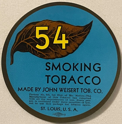 Circular blue tobacco label with brown leaf illustration, yellow "54" text, and "Smoking Tobacco" printed below, made by John