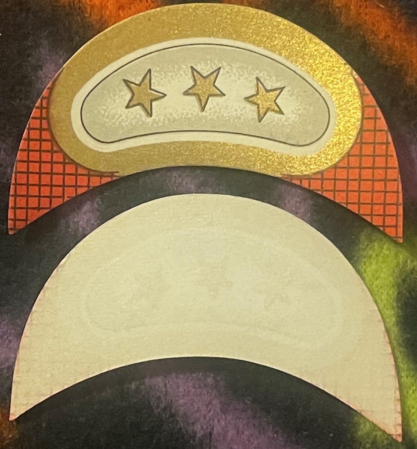 Two cream and gold embossed wine bottle labels with three-star and crescent moon designs, displayed stacked on a dark pattern