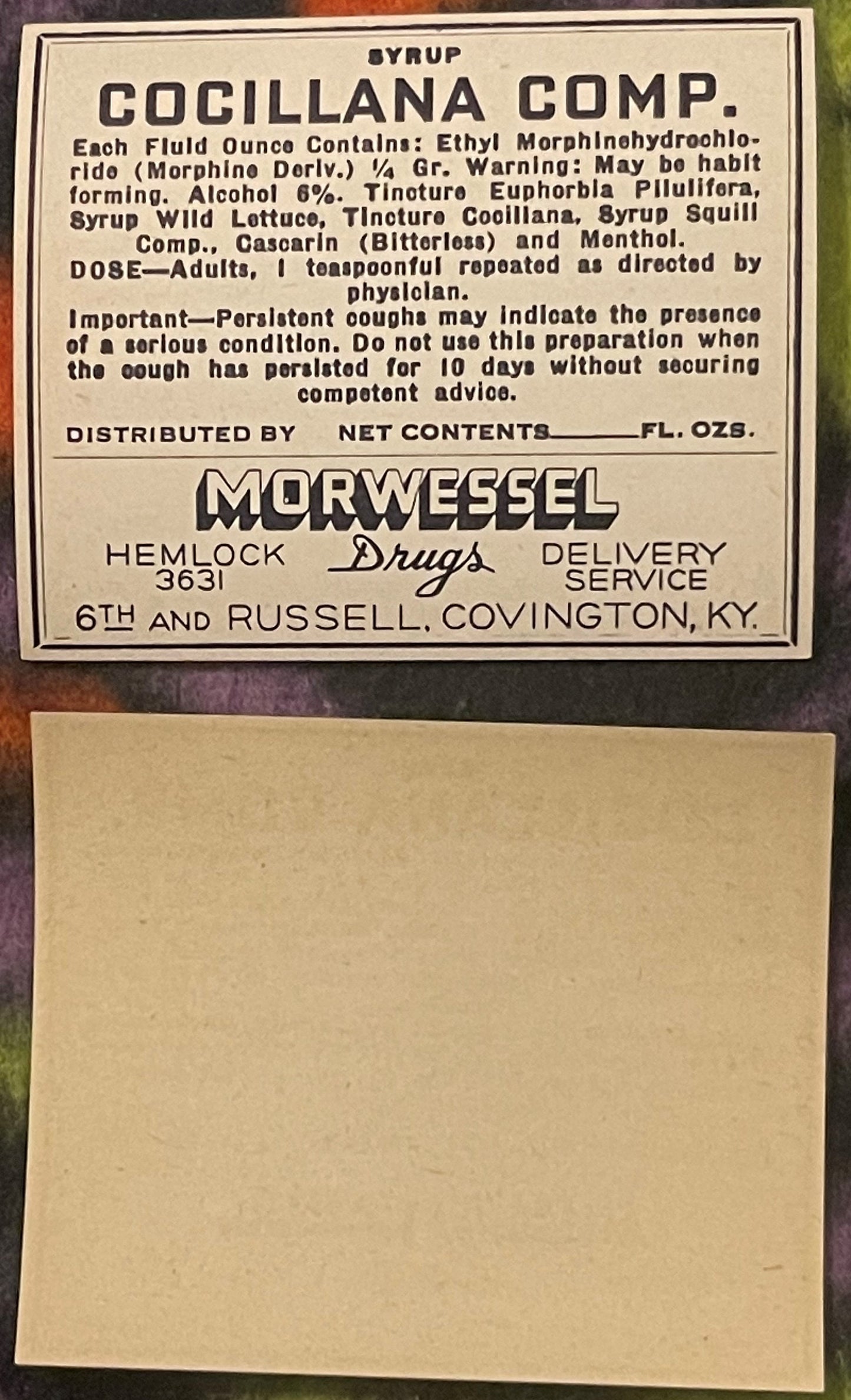 Vintage pharmacy label for Cocillana cough syrup containing morphine, printed on cream paper with black text, distributed by 