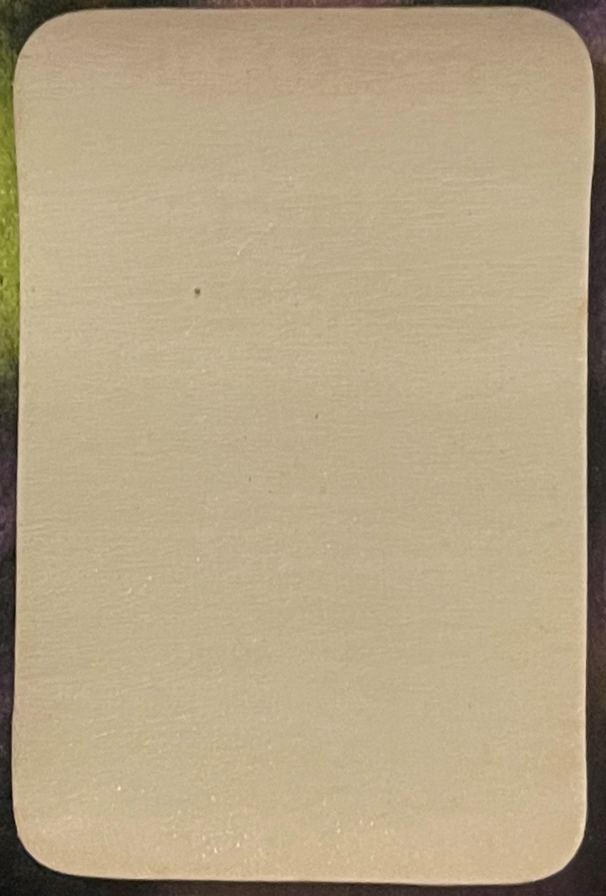 Blank cream-colored rectangular pharmacy label with rounded corners, shown flat against dark background