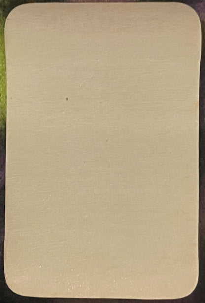 Blank cream-colored rectangular pharmacy label with rounded corners, shown flat against dark background