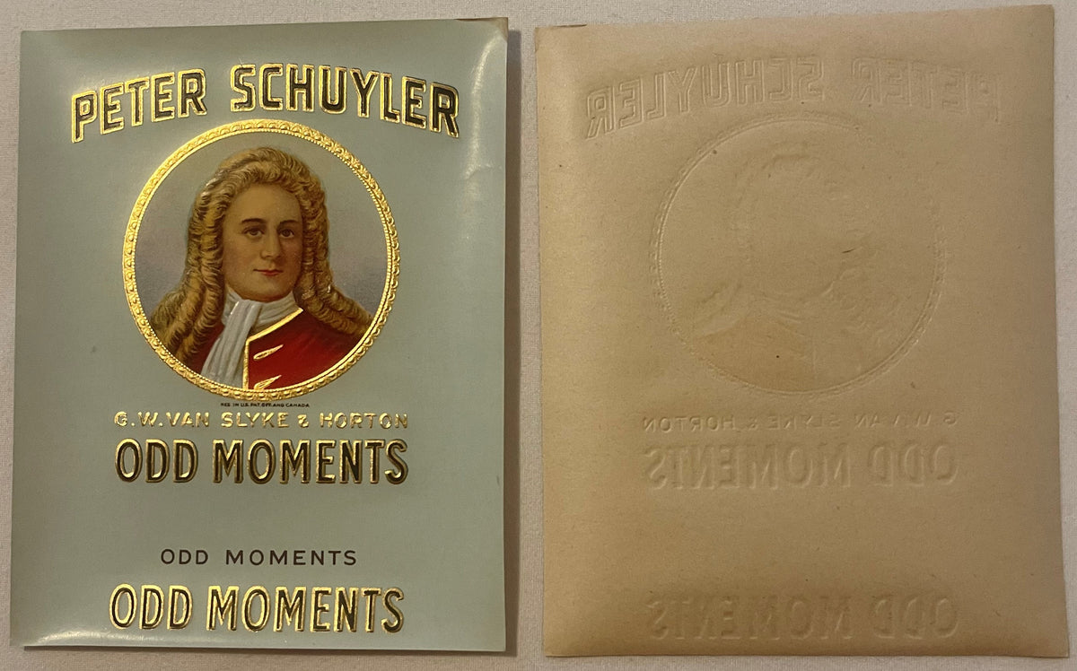 Front and back of embossed cigar box label featuring Peter Schuyler portrait in gold circle, red coat, with "Odd Moments"
