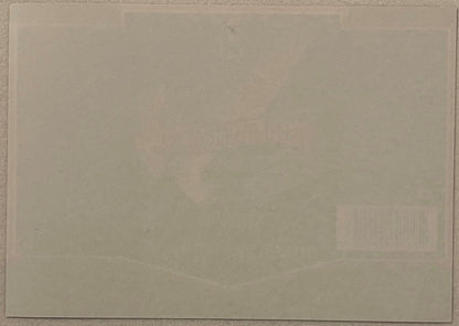 Blank cream-colored page or backing of vintage Odell Brewing beer label set against textured border