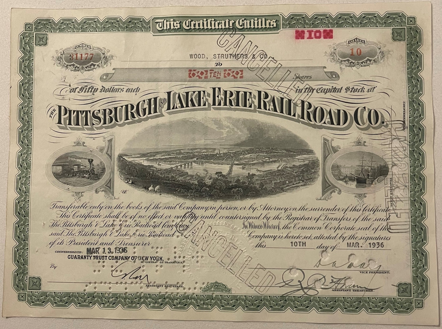 Ornate Pittsburgh & Lake Erie Railroad stock certificate with engraved border, central landscape vignette, and locomotiv