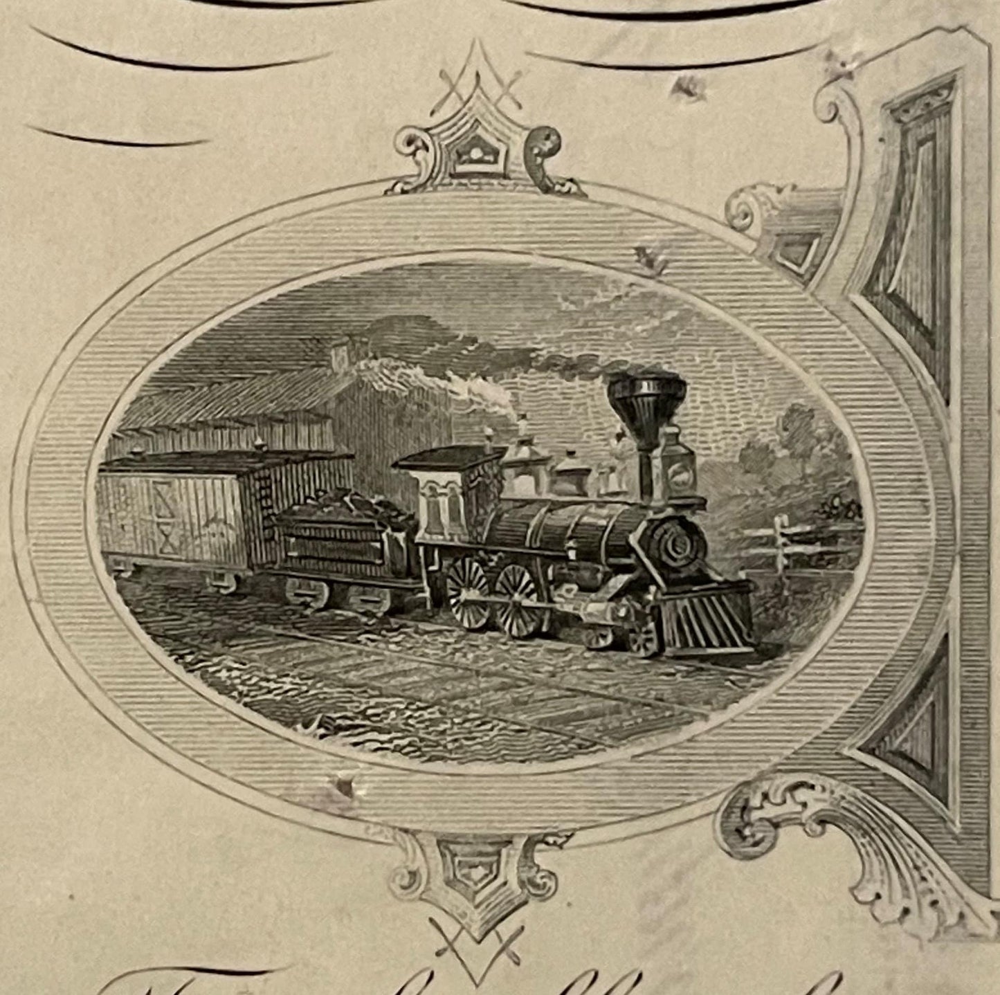 Engraved oval vignette of a steam locomotive with passenger car on railroad tracks, framed by ornate scrollwork borders on ag