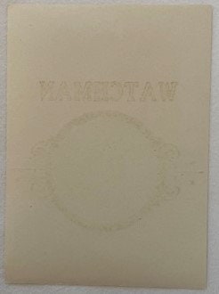 Cream-colored embossed cigar label with "WATCHMAN" text and circular design featuring Scottish Terrier dog, shown flat agains