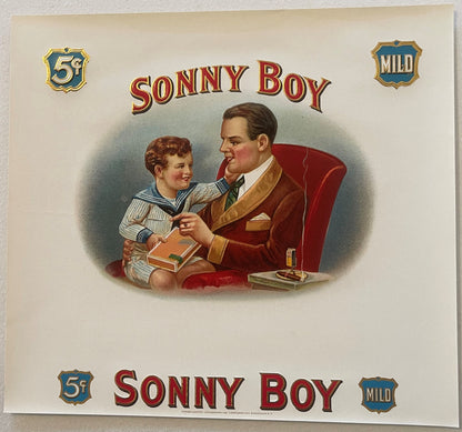 Vintage Sonny Boy cigar label with man in red jacket and young boy in sailor outfit holding books, 5¢ and Mild badges visible
