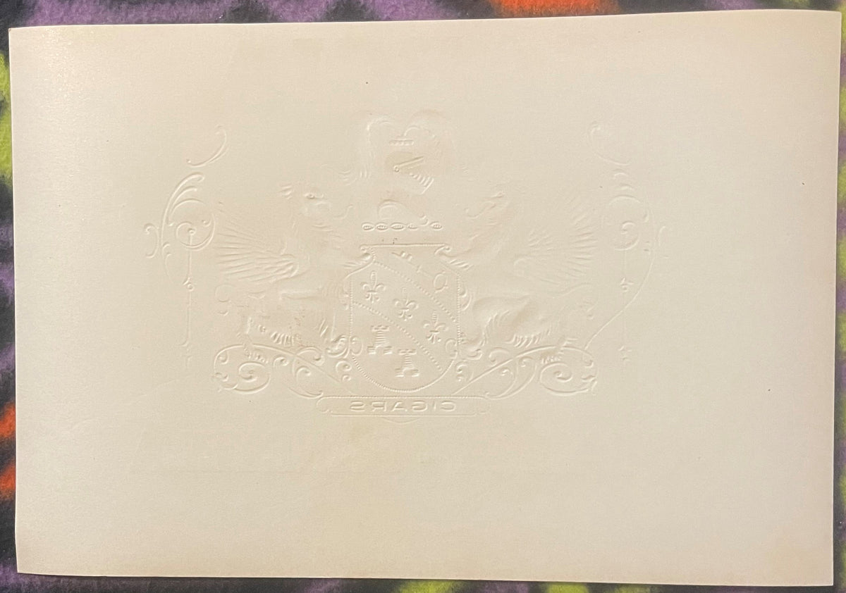 Cream-colored embossed cigar label featuring ornate heraldic design with winged lions and fleur-de-lis shield, Garcia text vi