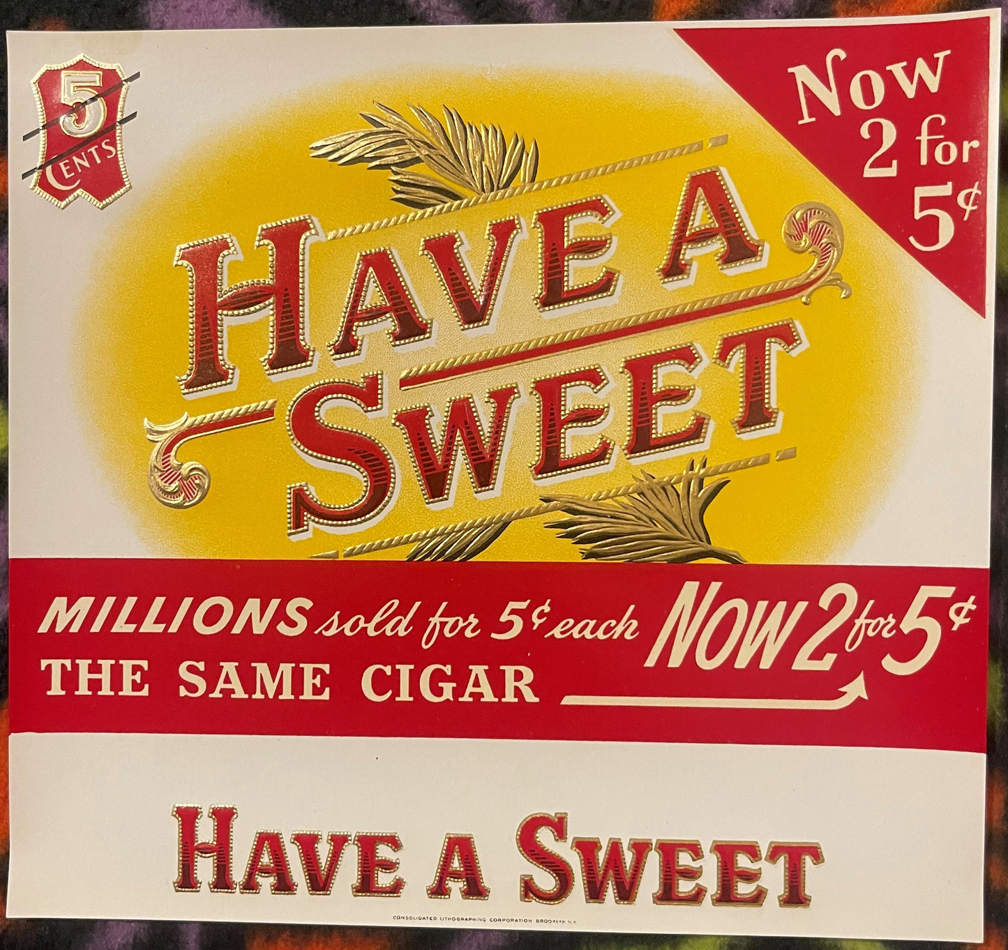 Antique cigar label with red and gold embossed lettering reading "Have A Sweet" on cream background, promotional pricing visi