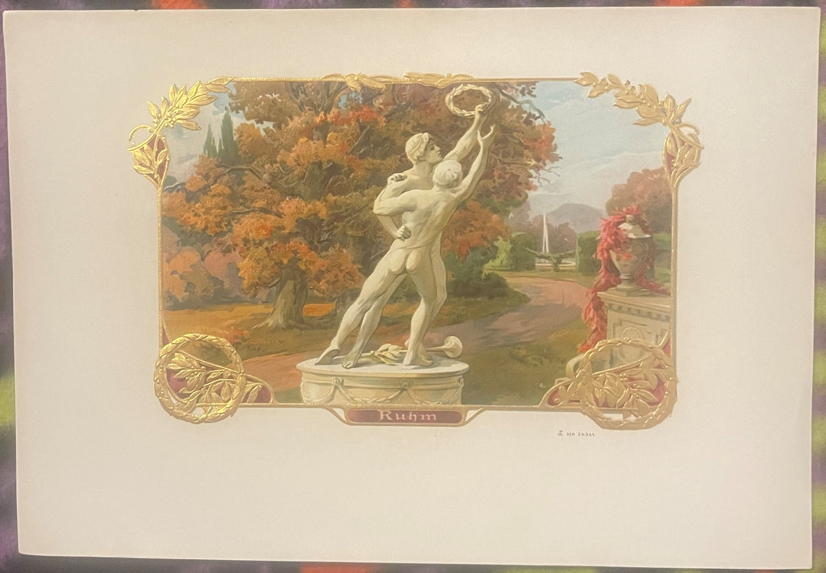 Antique chromolithograph cigar box label featuring a neoclassical male statue in a garden setting with gold embossed decorati
