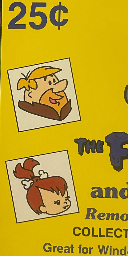 Yellow vending sign priced at 25¢ featuring cartoon characters Fred Flintstone and Pebbles with partial text visible