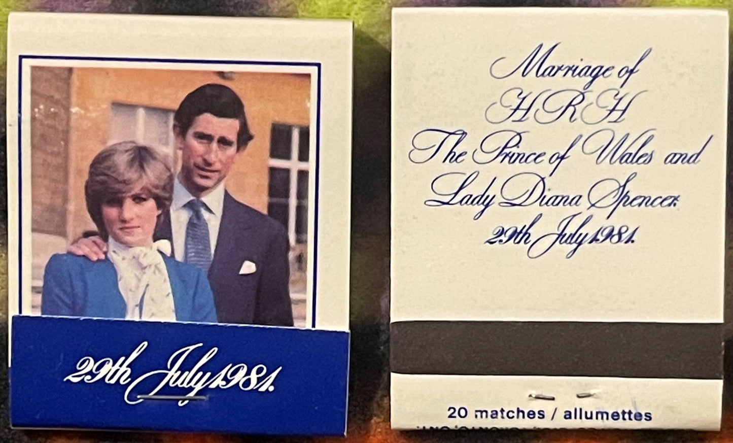 Two vintage 1981 Royal Wedding matchbook covers showing Prince Charles and Lady Diana with dates and text in cursive script a