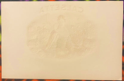 Cream-colored embossed cigar label with "Calsetta" text at top and ornate Victorian royal coat of arms design in center relie