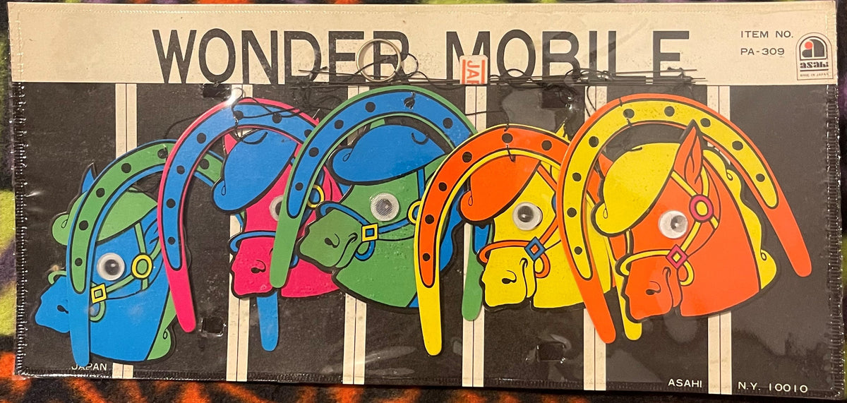 Vintage Wonder Mobile box featuring five colorful neon horses in blue, pink, green, yellow, and orange arranged in a carousel