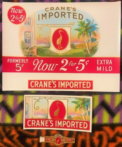 Three vintage Crane's Imported cigar labels featuring red crane bird emblems and tropical imagery, with price changes from 3¢