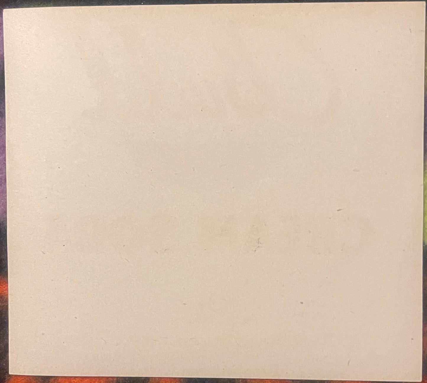 Blank cream-colored vintage soda label with slight discoloration and wear marks visible on aged paper stock