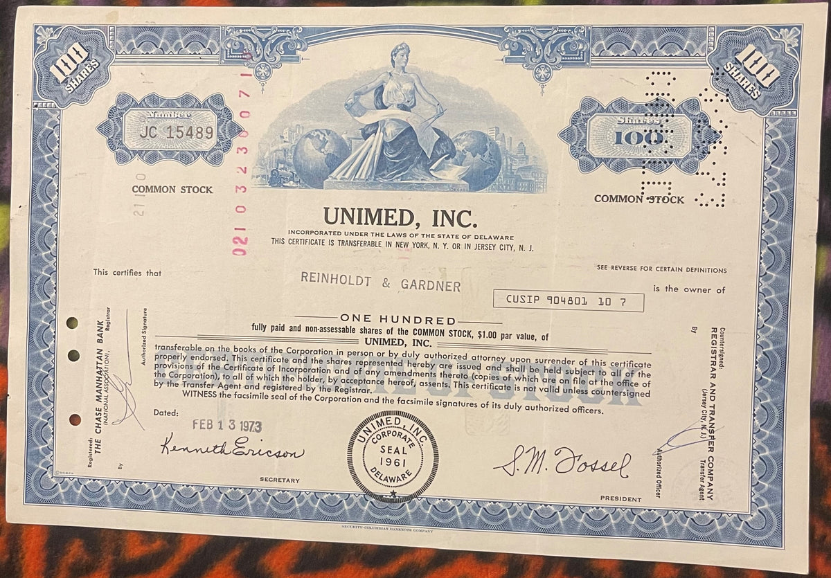 Vintage Unimed Inc stock certificate with blue decorative border, 100 shares, Delaware inc