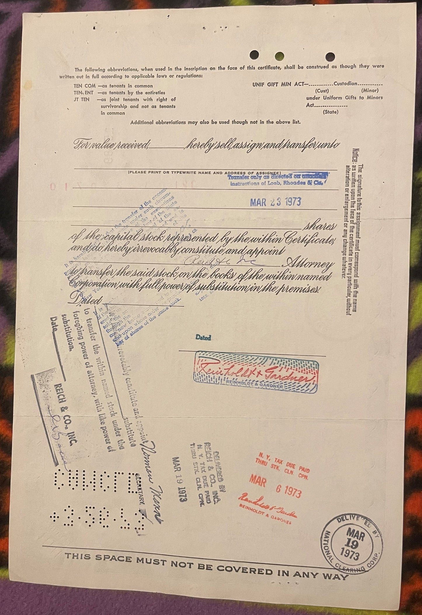 Vintage Unimed Inc stock certificate for 100 shares, Madison NJ, with handwritten signatures, stamps, and postal marking