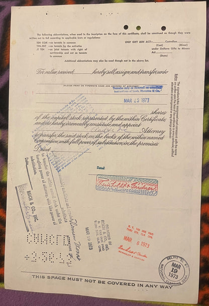 Vintage Unimed Inc stock certificate for 100 shares, Madison NJ, with handwritten signatures, stamps, and postal marking