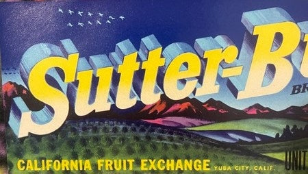 Vintage fruit crate label with yellow "Sutter-Buttes" text, mountain landscape, and "California Fruit Exchange Yuba City, Cal
