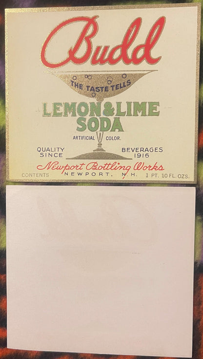 Vintage Budd Lemon & Lime Soda label from Newport Bottling Works, cream and gold with red text, showing bottle contents of 1 