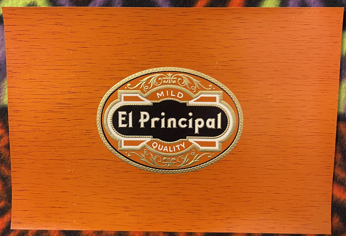 Wooden cigar box lid with gold-embossed oval label reading "El Principal" marked "Mild Quality" in ornate serif lettering on 