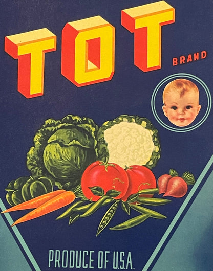 Vintage Tot Brand vegetable crate label with red and yellow 3D lettering, smiling baby portrait, and illustrated produce incl