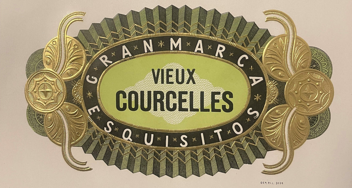 Ornate vintage cigar label with gilt embossed borders, lime green center oval, and black band reading "G. RANMARCA VIEUX COUR