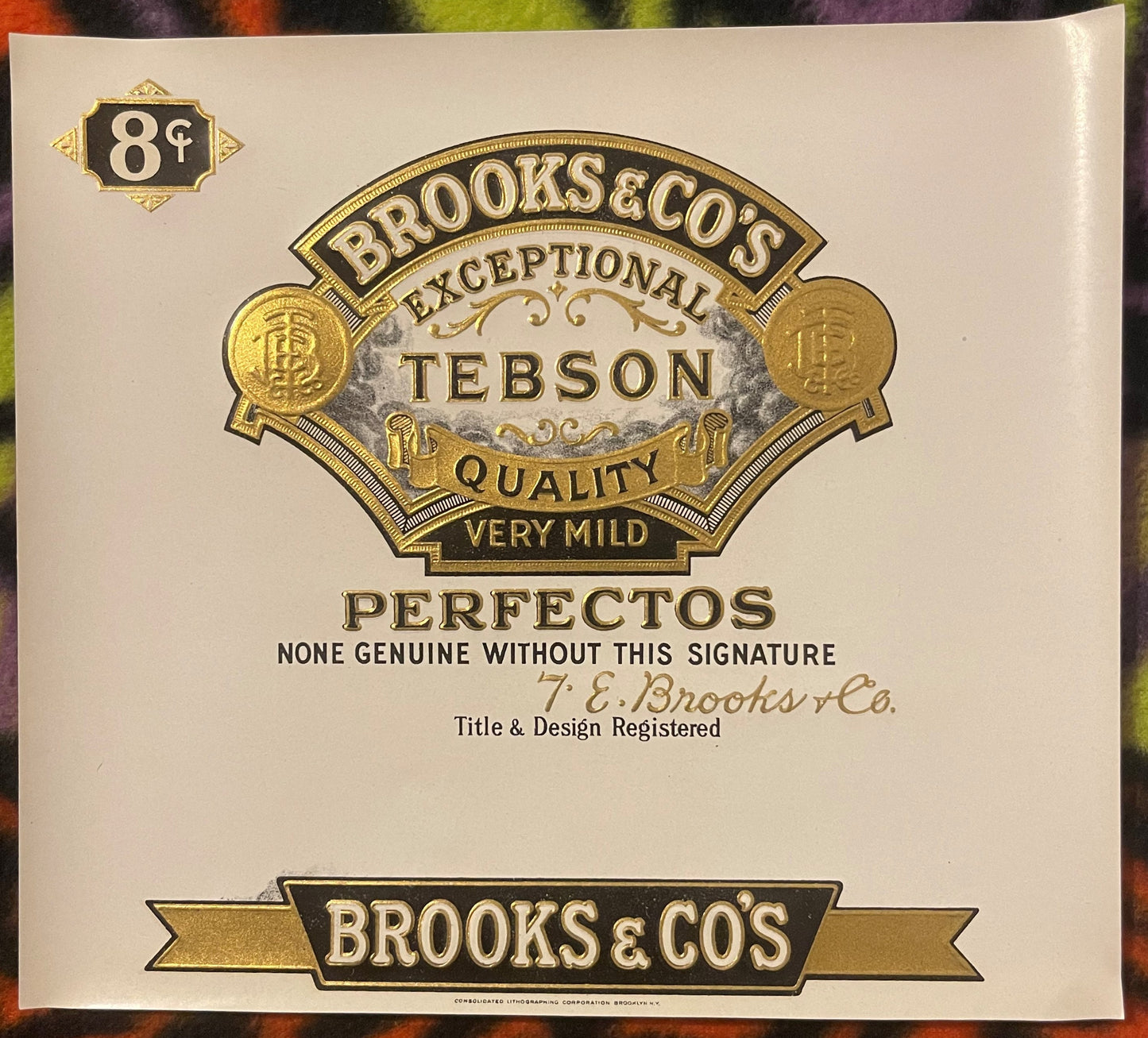Antique Brooks & Co's Tebson Perfectos cigar label with gold embossed ornate badge, "Very Mild" and "Exceptional Quality" tex