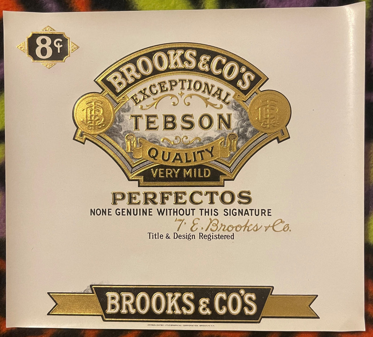 Antique Brooks & Co's Tebson Perfectos cigar label with gold embossed ornate badge, "Very Mild" and "Exceptional Quality" tex