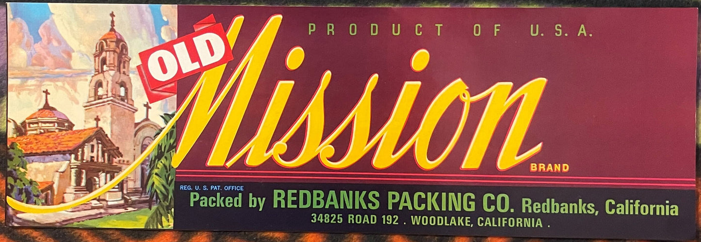 Vintage citrus crate label with "Old Mission" brand in yellow script, mission church imagery, and Redbanks Packing Co details