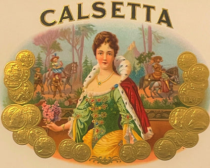Antique Calsetta cigar label with gold-embossed border of coins, featuring a woman in green gown with red cape holding flower