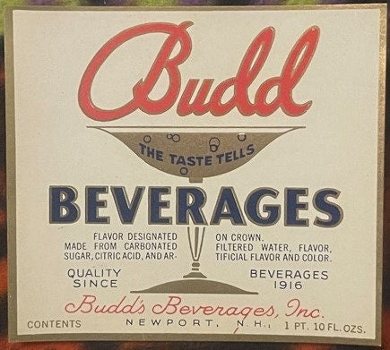 Vintage Budd Beverages label with red script logo, navy text, and cream background, showing contents of 1 pint 10 fluid ounce