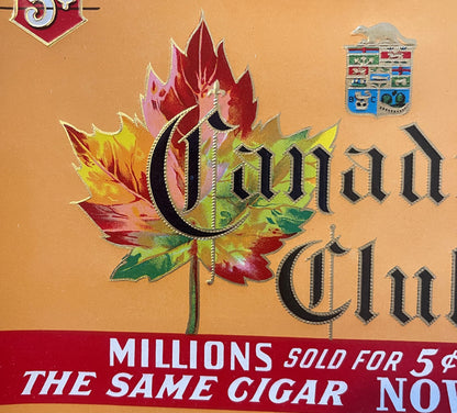 Vintage cigar label with ornate red and yellow maple leaf, black text reading "Ounun" and "Ounun", red banner stating "MILLIO