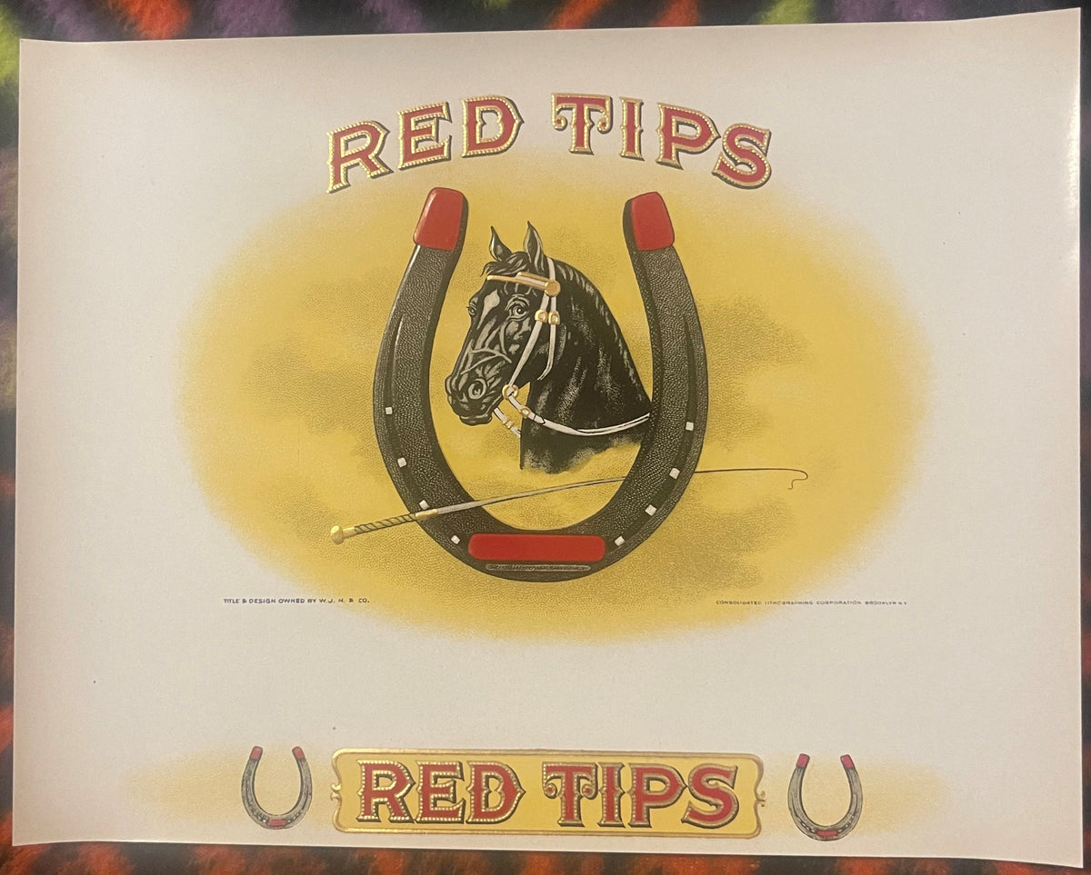 Red Tips embossed cigar label: black horse's head inside a red-tipped horseshoe with a riding crop, RED TIPS above and again on a gold panel between two small horseshoes